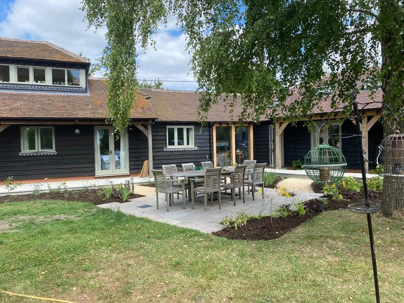 Barn conversion patio and border planting
